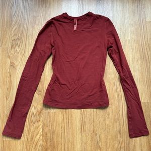 Skims Soft Lounge Long Sleeve in Wine.